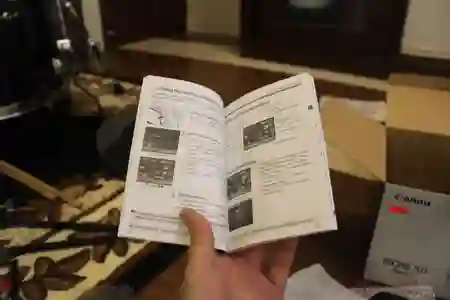 Photo - Reading 5D II Manual while battery charges