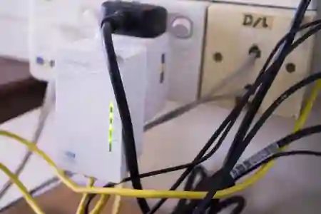 Photo - Powerline WiFi extender on second floor while 4G router is on first floor
